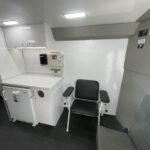 The inside of a Exam Room and Blood Draw Station Mobile Health Vehicle, Group C