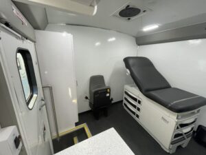 The inside of a Exam Room and Blood Draw Station Mobile Health Vehicle, Group C